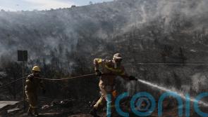Greek firefighters battle wildfires near Athens for second day