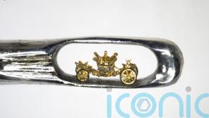 Sculptor creates tiny royal coach in the eye of a needle as Jubilee tribute