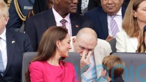 Mike Tindall keeps his eye on cheeky Prince Louis at Jubilee Pageant