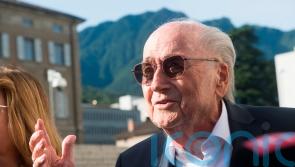 Smiling Blatter enters court at start of Fifa fraud trial