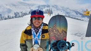 Music teacher whose “trapped nerve” turned out to be MS keeps snowboarding despite having no feeling below her knees and aims for the Paralympics