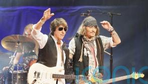 Johnny Depp returns to jazz festival as guitarist Jeff Beck’s surprise guest
