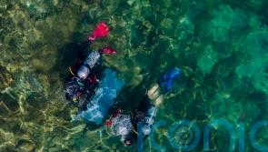 Israeli divers haul rubbish from ancient site for Oceans Day