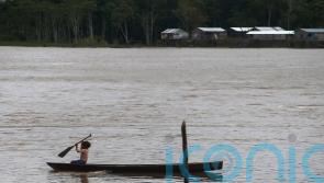 Divers find backpack and laptop in remote Amazon where Dom Phillips vanished