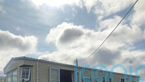 Man and woman arrested over man’s gun death at caravan park