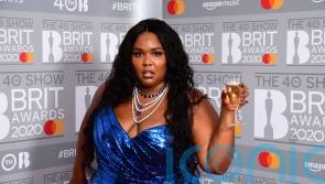 Lizzo announces new version of song Grrrls following backlash over ableist lyric