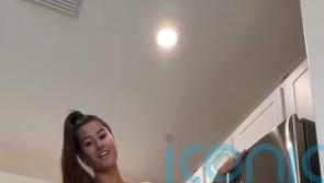 A 6ft 2in ex-accountant once shy about her height makes £80k a month from OnlyFans videos which include standing on camera looking giant