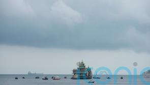 Floating Hong Kong restaurant that fed the Queen and Tom Cruise is towed away
