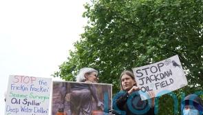Three arrested after climate protesters take over Shell shareholder meeting