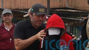 Brazilian police take suspect to search area for missing Briton