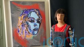 Robot artist Ai-Da paints Glastonbury headliners ahead of festival attendance