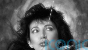 Kate Bush breaks trio of chart records as Running Up That Hill claims top spot