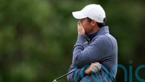 Rory McIlroy battles to remain in contention after breezy conditions at US Open