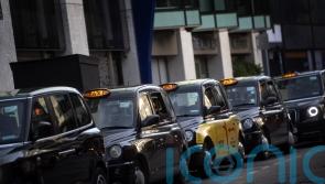 Travellers criticise ‘disgraceful’ taxi fares as demand surges amid rail strikes