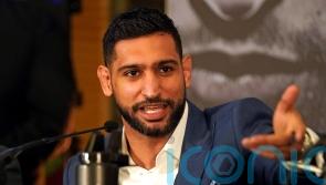 Three men charged after boxer Amir Khan ‘robbed at gunpoint’