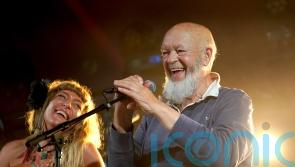 Glastonbury crowd chant ‘we love you Michael we do’ to festival founder