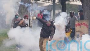 One dead and dozens hurt on 12th day of protesting in Ecuador