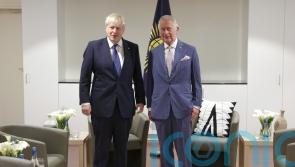 Johnson and Charles enjoy ‘good old chinwag’ despite Rwanda asylum row
