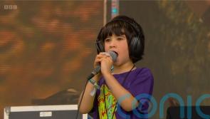 Neil Finn’s grandson ‘steals show’ after joining Crowded House Glastonbury set