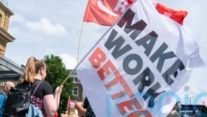 Striking hospital workers turn up at RMT rally in show of support for rail staff