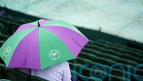Rain makes early appearance as Wimbledon gets under way