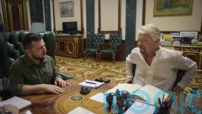 Ukraine President Volodymyr Zelensky meets Sir Richard Branson in Kyiv