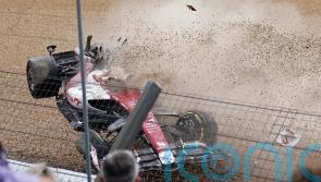 Zhou Guanyu’s Alfa Romeo overturns in first-lap crash at British Grand Prix