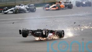 Zhou Guanyu escapes major injury after ‘horrific’ first-lap crash at Silverstone
