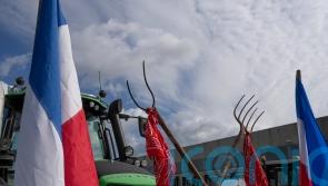 Dutch farmers block entrances to supermarket warehouses
