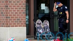 Police find man suspected in shooting at Chicago-area parade