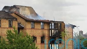 Resident describes explosion and aftermath of fire at Bedford flats
