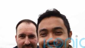 Newlyweds who used an app to pinpoint their first meeting place mark their love with matching tattoos of the 3 words showing the location