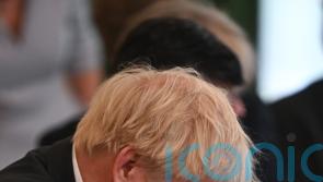 Johnson battles to retain grip on power as support drifts away