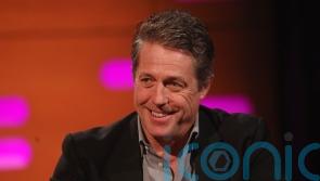 Hugh Grant behind Benny Hill theme tune being played in Westminster