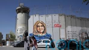 Loved ones of journalist killed in West Bank lash out at US President Joe Biden
