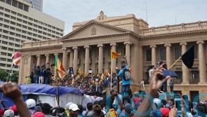 Sri Lankan PM agrees to resign as protesters storm residence of president