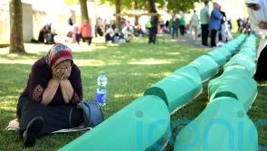 Thousands gather to mark Srebrenica massacre and bury victims