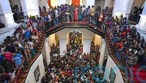 Sri Lanka’s political chaos persists as crisis talks to replace leader go on