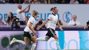 Germany ease to win over Spain to qualify as group winners