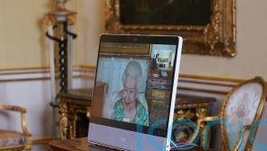 Queen appears on screen for virtual audiences