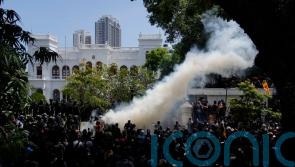 President flees Sri Lanka amid crisis as ire turns toward PM