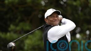 Tiger Woods struggles to make headway in unlikely bid to make Open cut