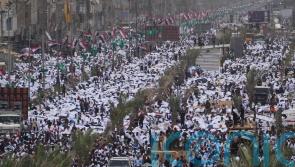 Tens of thousands attend prayers called by controversial Iraqi cleric