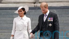 Queen said ‘thank goodness Meghan not coming’ to Philip’s funeral, book claims