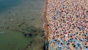 In Pictures: Thousands head to beaches as health boss warns of &lsquo;ferocious heat&rsquo;