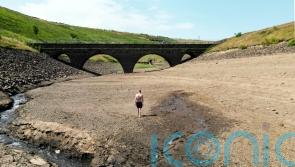 Disruption as UK swelters in extreme heat, with 41C forecast for Tuesday