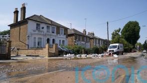 Burst water main floods London streets as temperatures soar