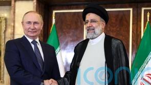 Vladimir Putin in Tehran for talks with leaders of Iran and Turkey
