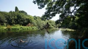 At least 13 dead after going into open water during heatwave