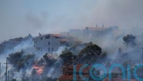 Fires threaten Athens’ hillside suburbs for second day